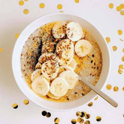 A picture of a bowl of granola with milk